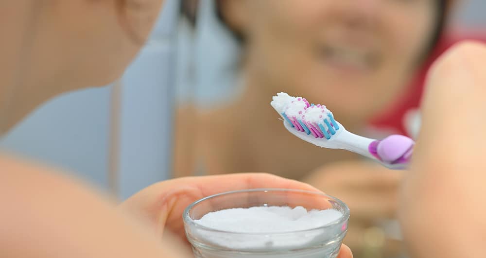Is It Okay To Brush My Teeth With Baking Soda? | Dr. Rebecca Rath DMD